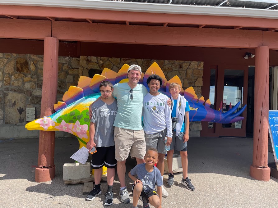 Sam sharing an arcade outing with his son