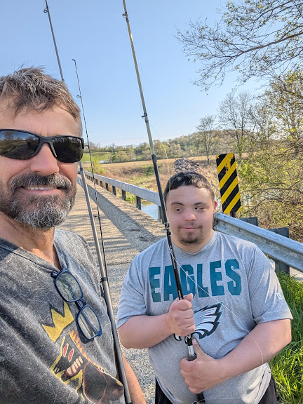 Sam and his son fishing together at Big Bureau Creek