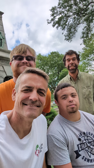 Sam and his son with friends