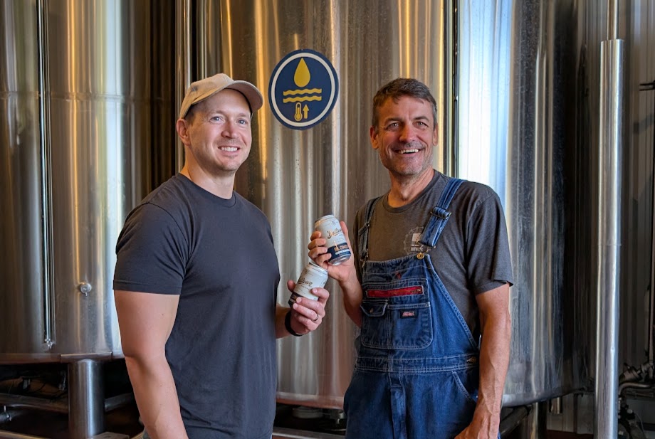 Sam with a friend at a nonalcoholic brewery